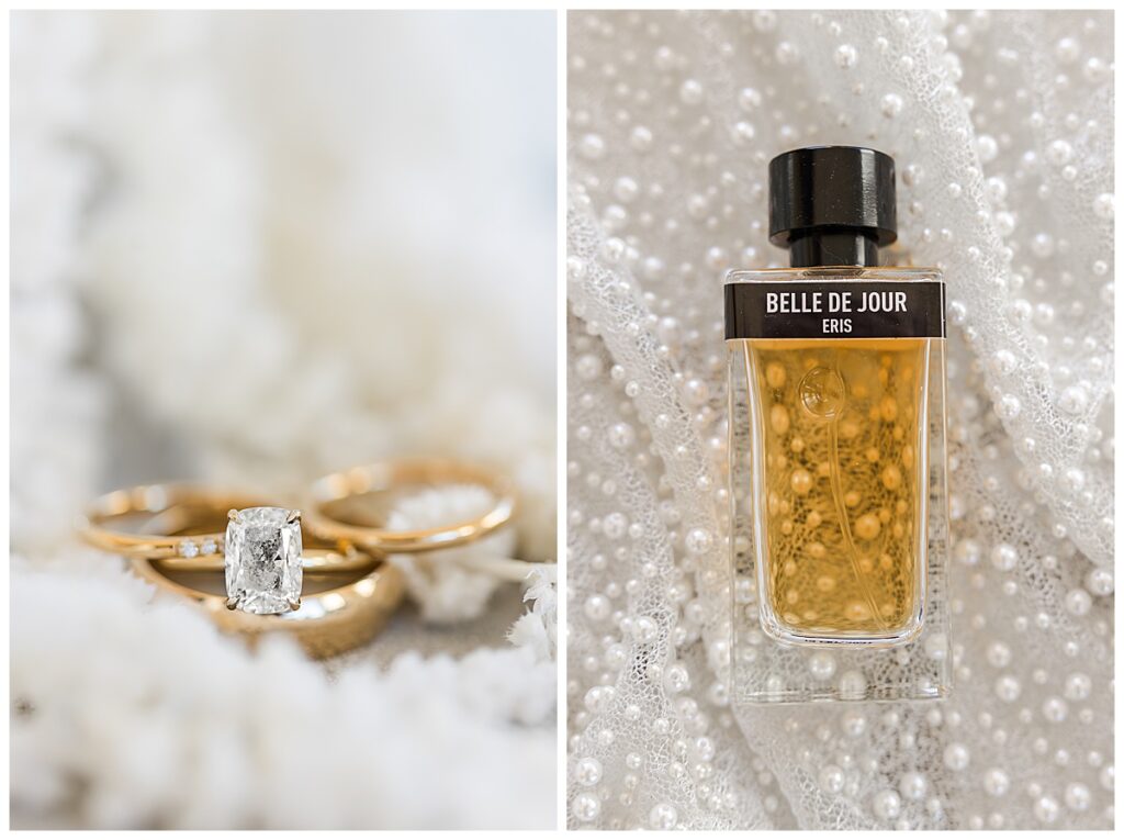 three wedding rings and a perfume bottle on wedding dress