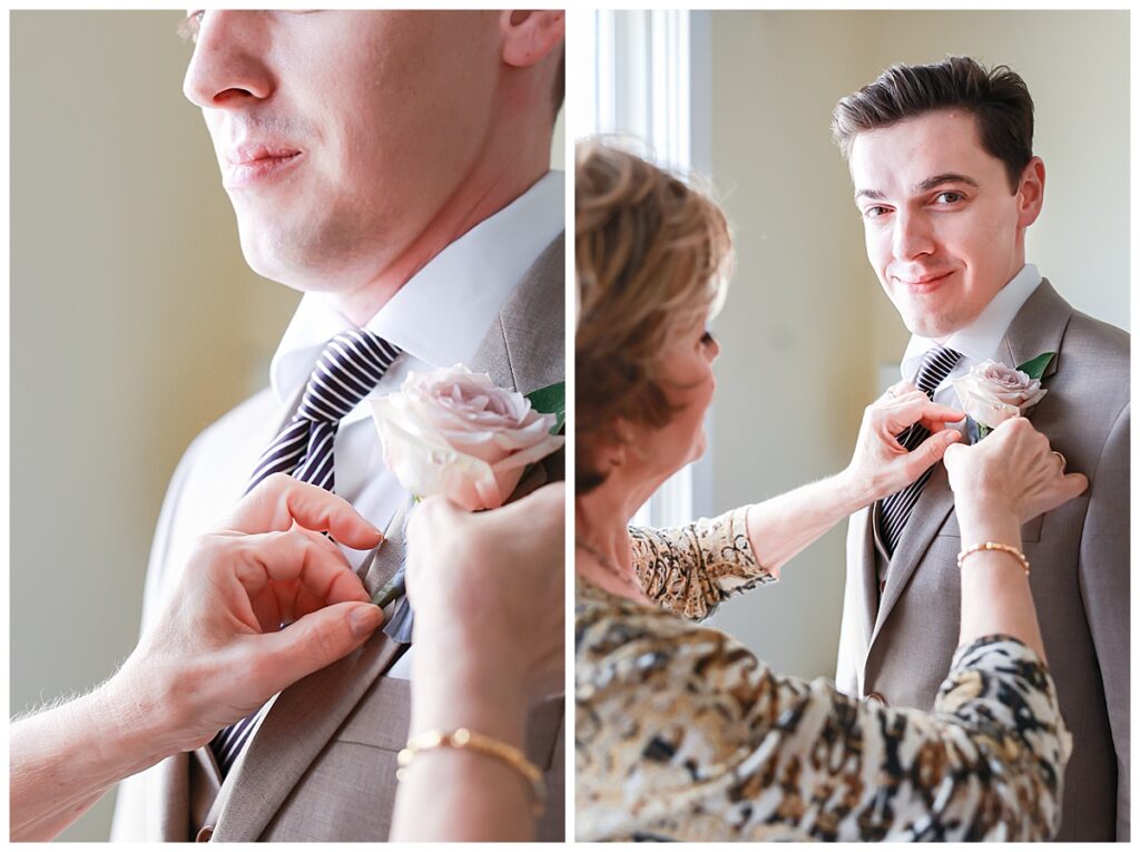 groom's mother putting on his boutonniere