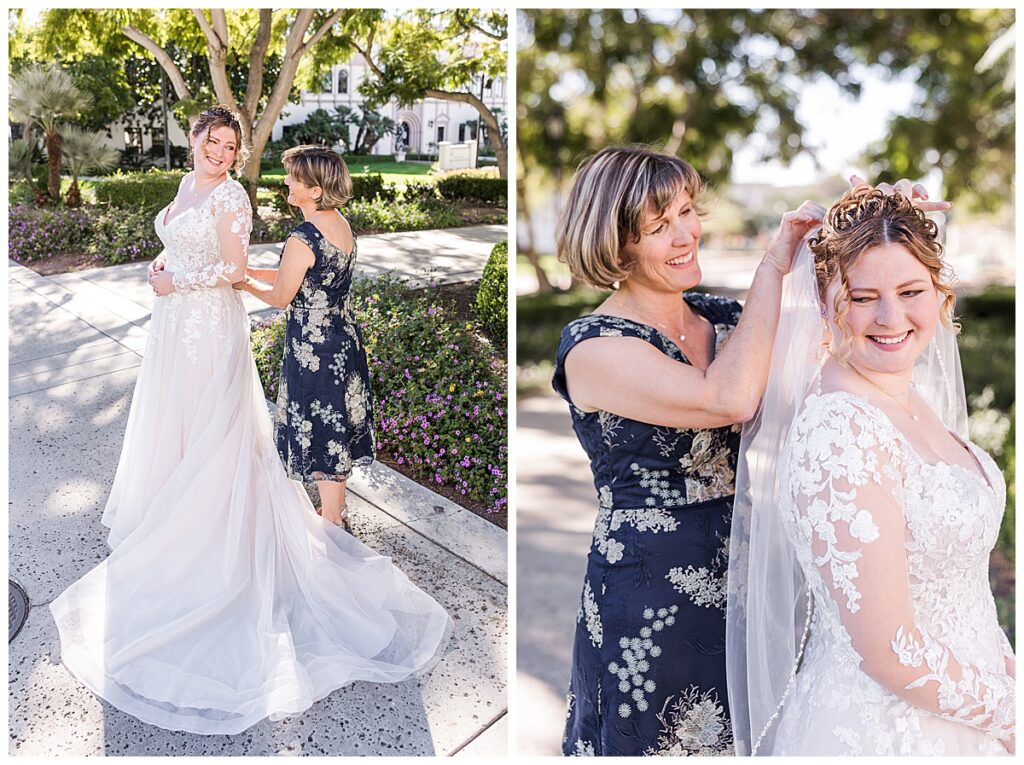 Mother buttoning up daughter in wedding dress and putting on veil
