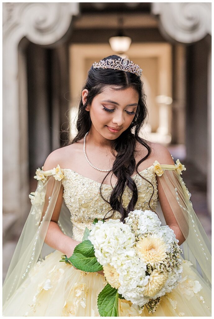 Balboa Park Quinceanera photo session of girl with yellow bouquet