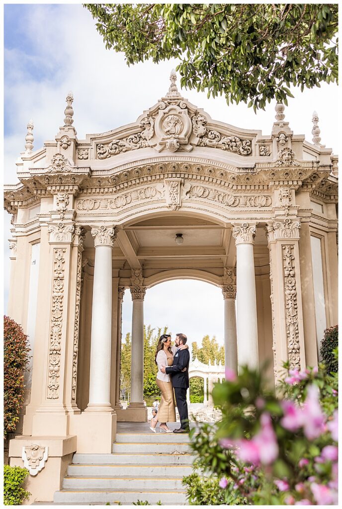 couple in organ pavilion at their Engagement Session at Balboa Park 