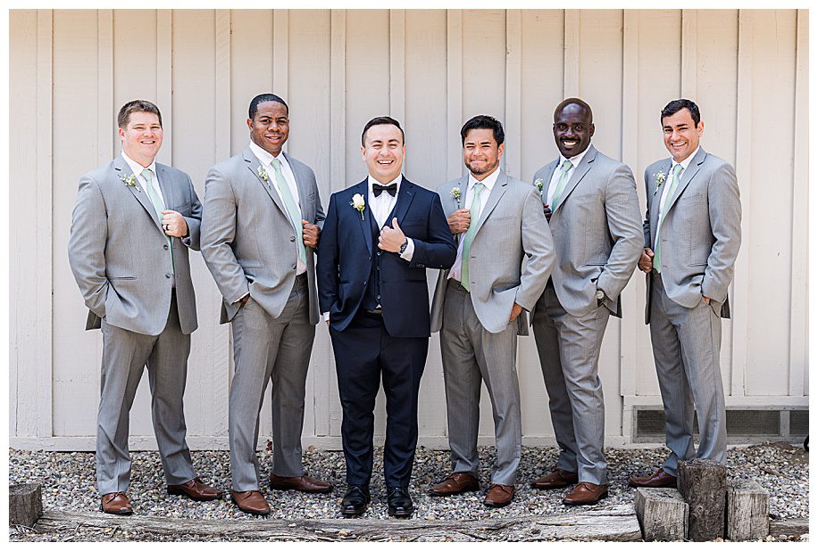 groom and groomsmen in grey suits