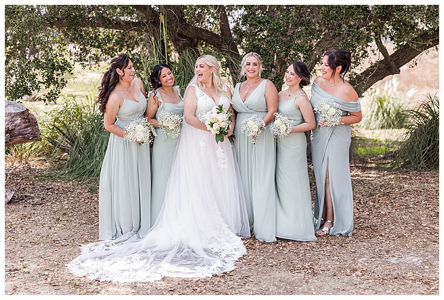WestWynd Ranch Wedding bride with bridesmaids laughing