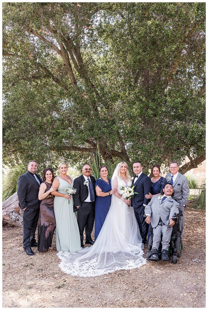 family with bride and groom at their WestWynd Ranch Wedding