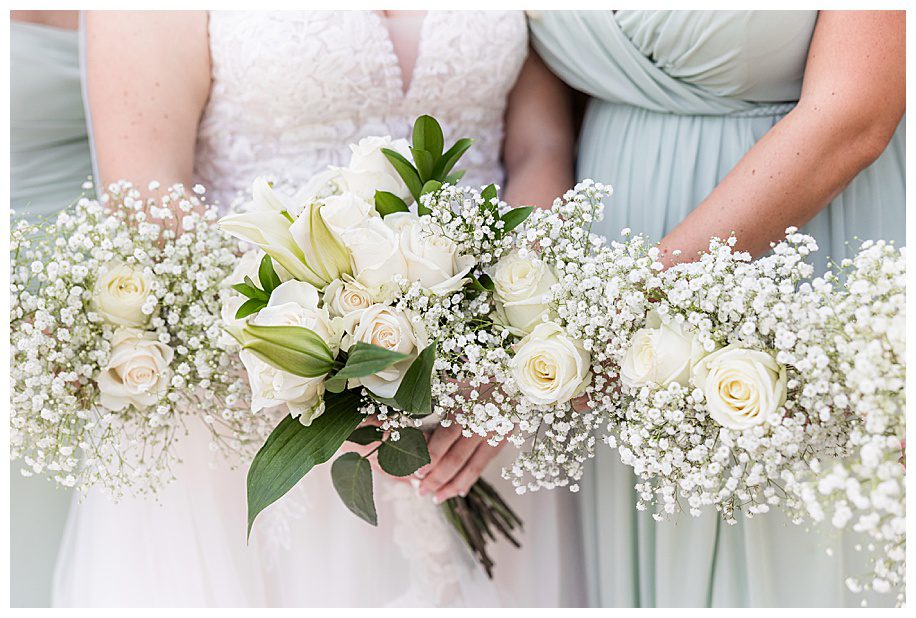 white roses and baby's breath bridal bouquet