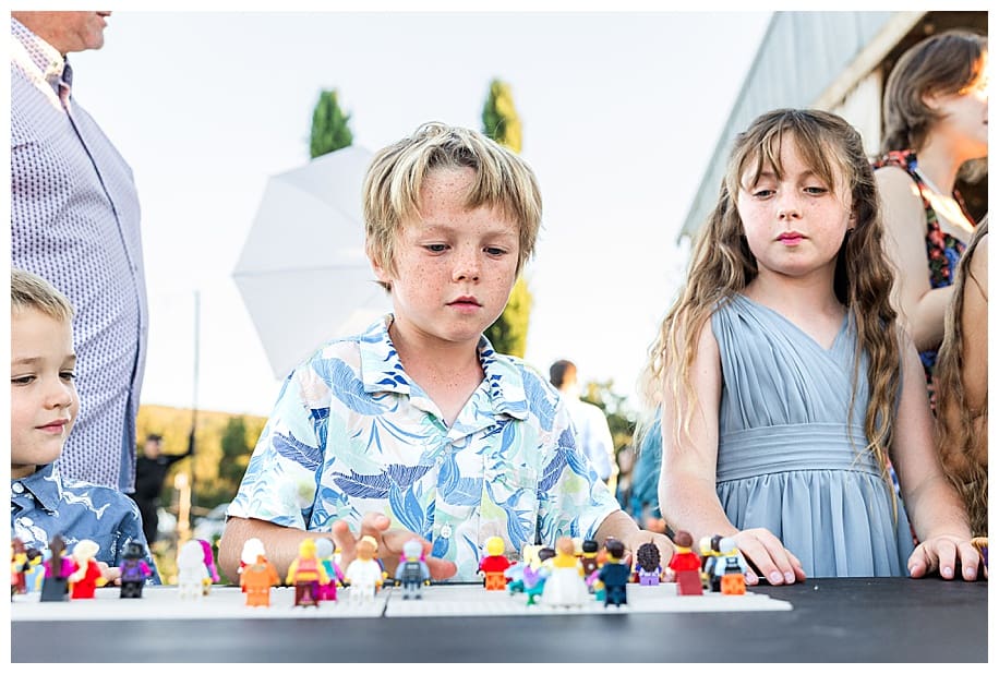 children playing with leggos at wedding