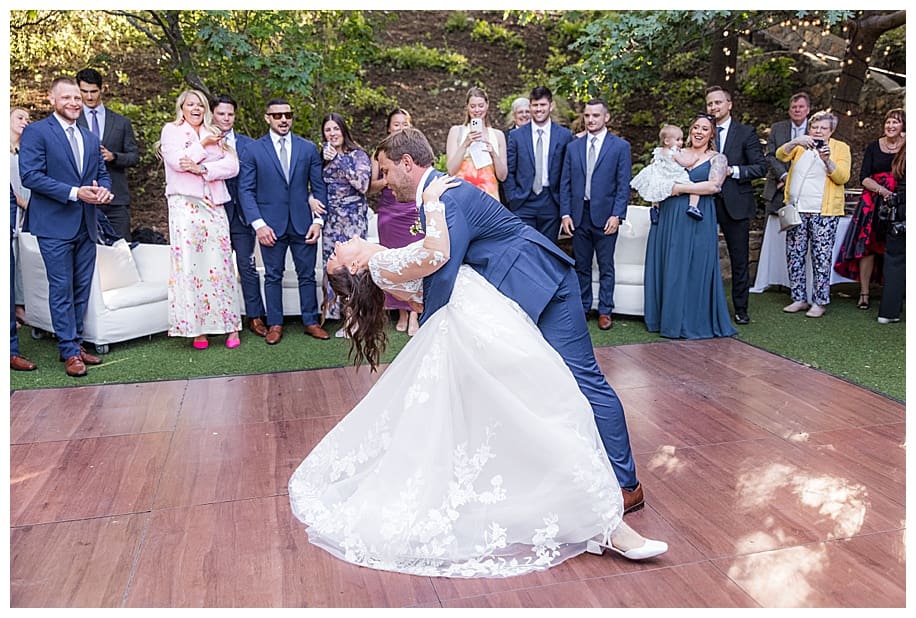groom dipping bride during first dance at their Sacred Mountain Wedding