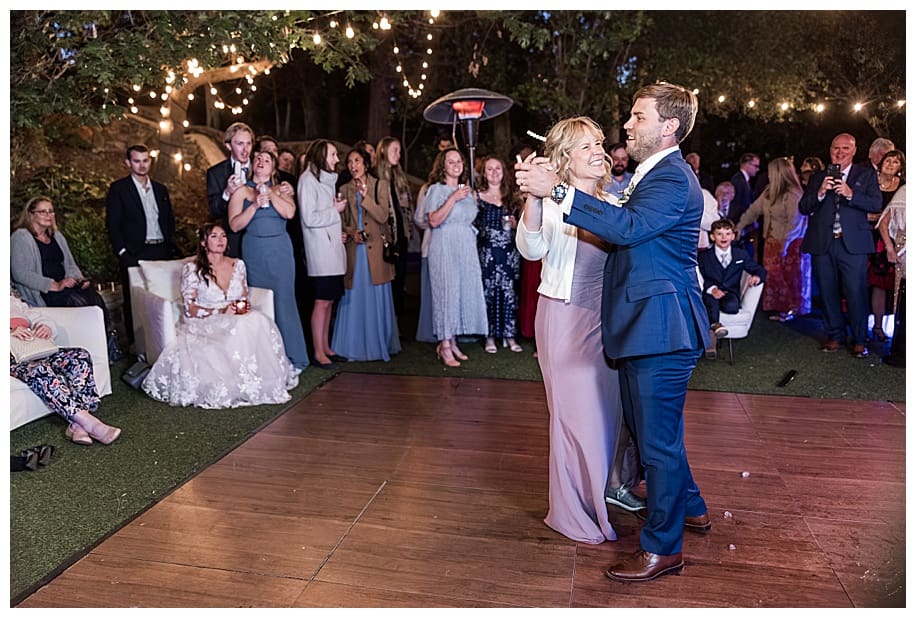 Sacred Mountain Wedding reception with groom and mom dancing