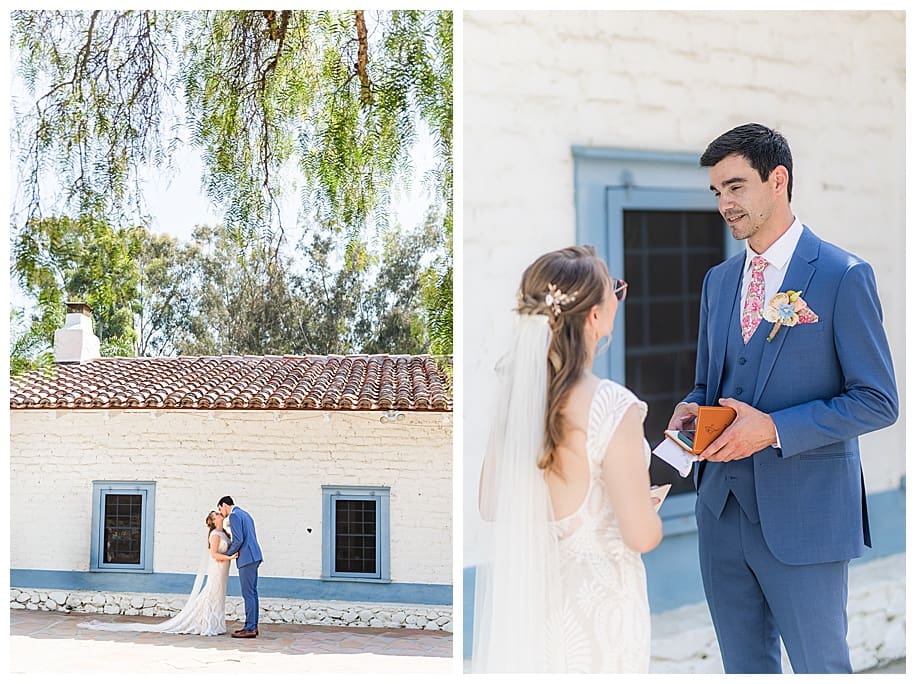 bride and groom during first look in front of an adobe