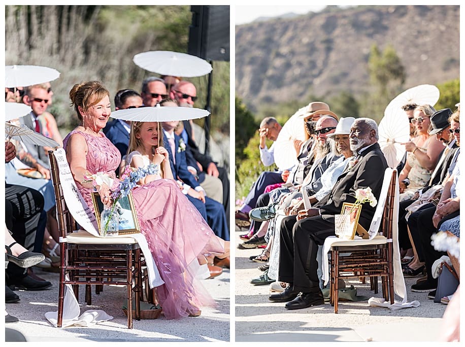 parents under parasols at Enchanted Hills Estate Wedding ceremony